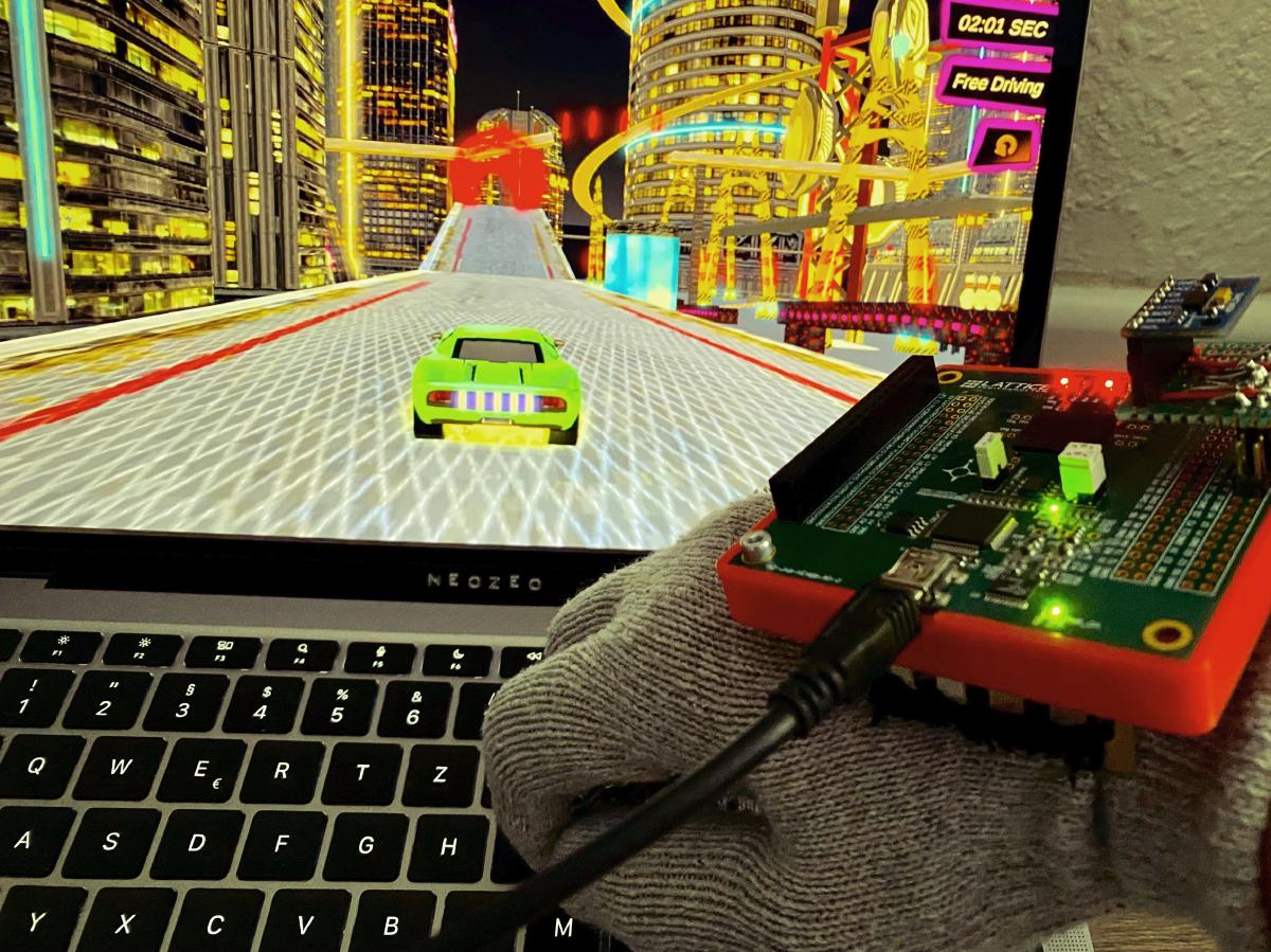 Nitro Glove: Gesture-Controlled Gaming using FPGA on glove